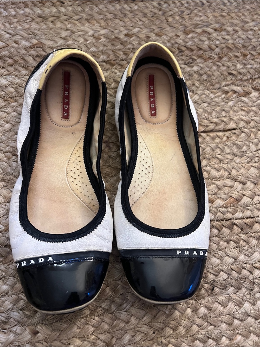 Prada White Leather Ballet Flats with Black Patent Toe and Yellow Heel Trim